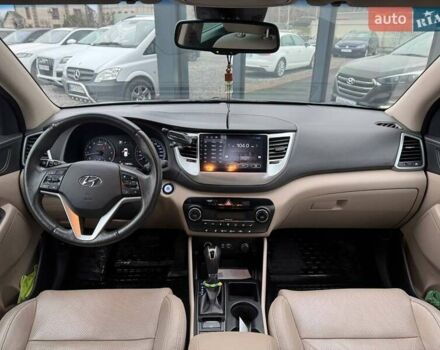 Коричневый Хендай Туксон, объемом двигателя 2 л и пробегом 115 тыс. км за 20990 $, фото 12 на Automoto.ua