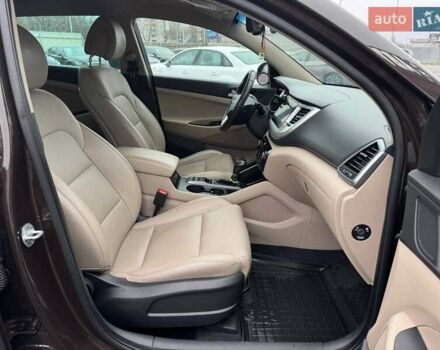 Коричневый Хендай Туксон, объемом двигателя 2 л и пробегом 115 тыс. км за 20990 $, фото 11 на Automoto.ua