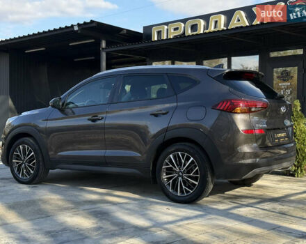 Коричневий Хендай Туксон, об'ємом двигуна 1.6 л та пробігом 132 тис. км за 22300 $, фото 2 на Automoto.ua