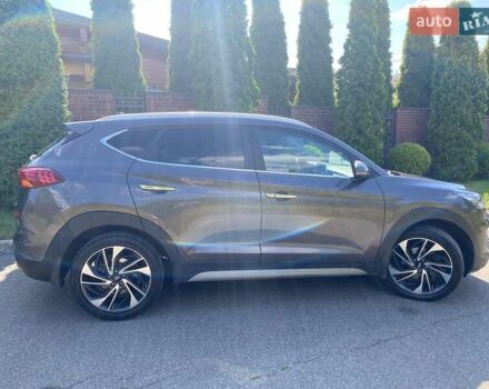 Коричневый Хендай Туксон, объемом двигателя 2 л и пробегом 93 тыс. км за 27750 $, фото 4 на Automoto.ua