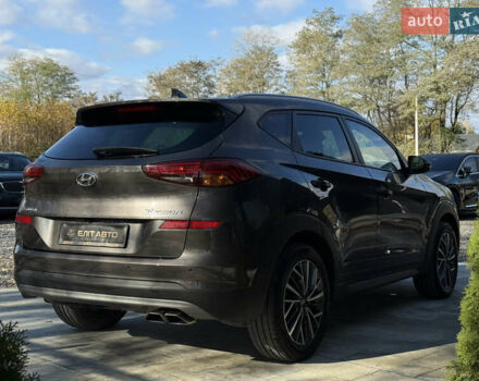 Коричневий Хендай Туксон, об'ємом двигуна 1.6 л та пробігом 132 тис. км за 22300 $, фото 3 на Automoto.ua