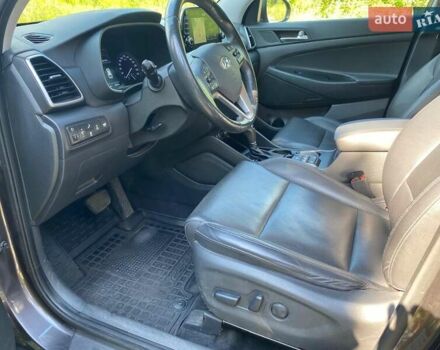 Коричневый Хендай Туксон, объемом двигателя 2 л и пробегом 93 тыс. км за 27750 $, фото 11 на Automoto.ua