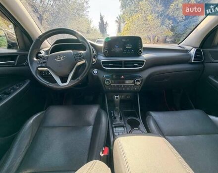 Коричневый Хендай Туксон, объемом двигателя 2 л и пробегом 98 тыс. км за 22000 $, фото 5 на Automoto.ua