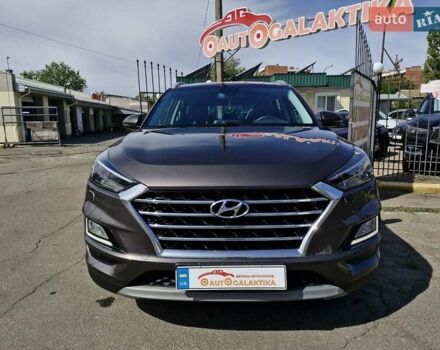 Коричневый Хендай Туксон, объемом двигателя 2 л и пробегом 127 тыс. км за 24999 $, фото 1 на Automoto.ua