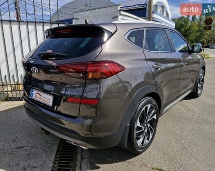 Коричневый Хендай Туксон, объемом двигателя 2 л и пробегом 127 тыс. км за 24999 $, фото 3 на Automoto.ua