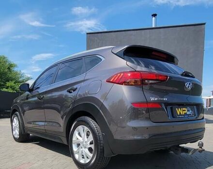 Коричневий Хендай Туксон, об'ємом двигуна 2 л та пробігом 200 тис. км за 20500 $, фото 4 на Automoto.ua