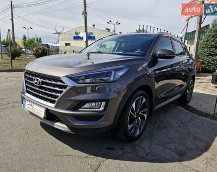 Коричневый Хендай Туксон, объемом двигателя 2 л и пробегом 127 тыс. км за 24999 $, фото 2 на Automoto.ua