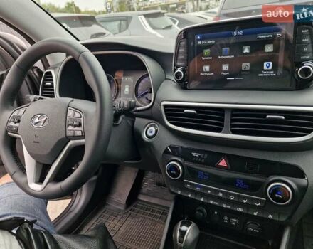 Коричневый Хендай Туксон, объемом двигателя 2 л и пробегом 127 тыс. км за 24999 $, фото 18 на Automoto.ua