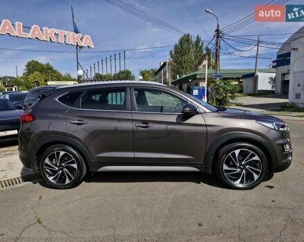 Коричневый Хендай Туксон, объемом двигателя 2 л и пробегом 127 тыс. км за 24999 $, фото 4 на Automoto.ua