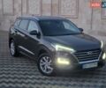 Коричневый Хендай Туксон, объемом двигателя 2 л и пробегом 98 тыс. км за 19998 $, фото 1 на Automoto.ua