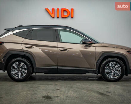 Коричневый Хендай Туксон, объемом двигателя 1.6 л и пробегом 55 тыс. км за 32877 $, фото 3 на Automoto.ua