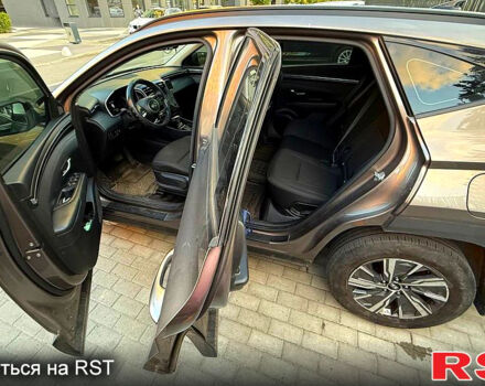 Коричневый Хендай Туксон, объемом двигателя 2 л и пробегом 63 тыс. км за 26700 $, фото 3 на Automoto.ua