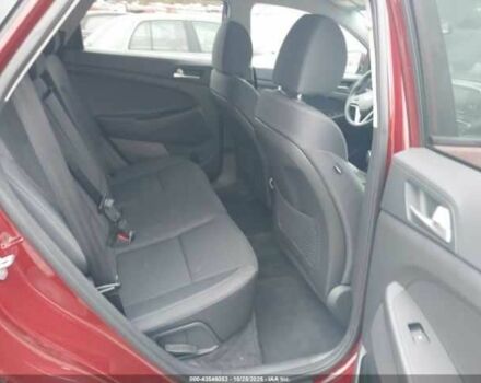 Красный Хендай Туксон, объемом двигателя 2.4 л и пробегом 12 тыс. км за 12000 $, фото 8 на Automoto.ua