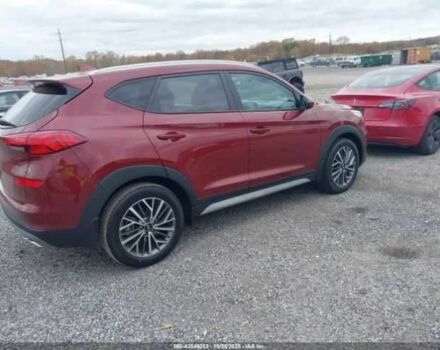 Красный Хендай Туксон, объемом двигателя 2.4 л и пробегом 12 тыс. км за 12000 $, фото 5 на Automoto.ua