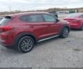 Красный Хендай Туксон, объемом двигателя 2.4 л и пробегом 12 тыс. км за 12000 $, фото 5 на Automoto.ua