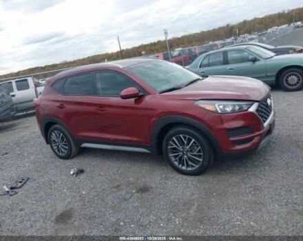 Красный Хендай Туксон, объемом двигателя 2.4 л и пробегом 12 тыс. км за 12000 $, фото 9 на Automoto.ua