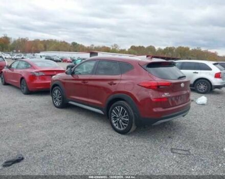 Красный Хендай Туксон, объемом двигателя 2.4 л и пробегом 12 тыс. км за 12000 $, фото 3 на Automoto.ua