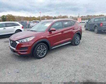 Красный Хендай Туксон, объемом двигателя 2.4 л и пробегом 12 тыс. км за 12000 $, фото 2 на Automoto.ua