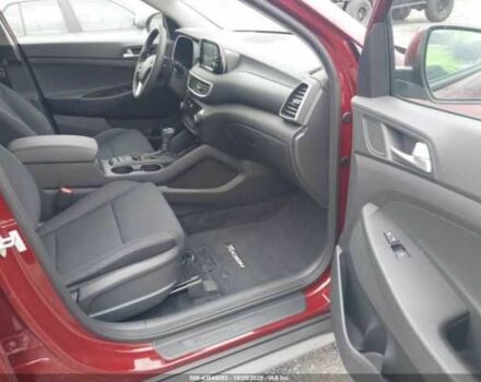 Красный Хендай Туксон, объемом двигателя 2.4 л и пробегом 12 тыс. км за 12000 $, фото 6 на Automoto.ua