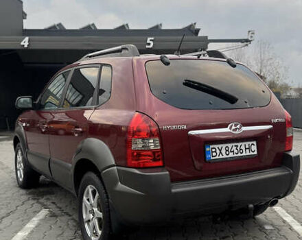 Красный Хендай Туксон, объемом двигателя 2 л и пробегом 255 тыс. км за 6999 $, фото 19 на Automoto.ua