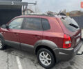 Красный Хендай Туксон, объемом двигателя 2 л и пробегом 255 тыс. км за 6999 $, фото 6 на Automoto.ua