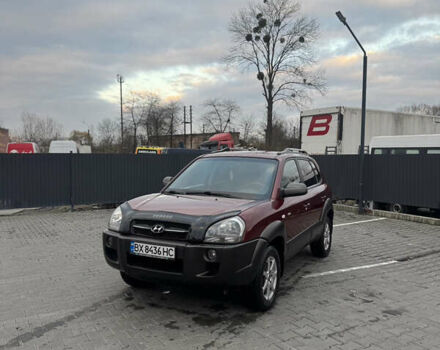 Красный Хендай Туксон, объемом двигателя 2 л и пробегом 255 тыс. км за 6999 $, фото 16 на Automoto.ua