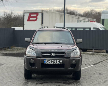 Красный Хендай Туксон, объемом двигателя 2 л и пробегом 255 тыс. км за 6999 $, фото 25 на Automoto.ua