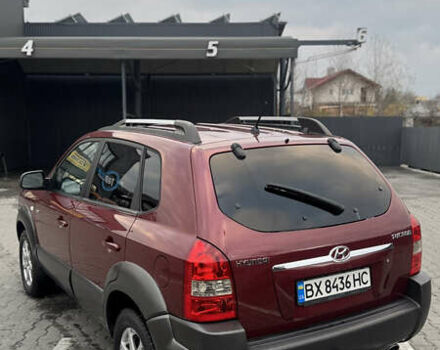 Красный Хендай Туксон, объемом двигателя 2 л и пробегом 255 тыс. км за 6999 $, фото 20 на Automoto.ua