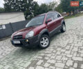 Красный Хендай Туксон, объемом двигателя 1.99 л и пробегом 190 тыс. км за 7099 $, фото 1 на Automoto.ua