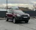 Красный Хендай Туксон, объемом двигателя 2 л и пробегом 255 тыс. км за 6999 $, фото 23 на Automoto.ua
