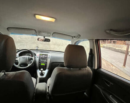 Красный Хендай Туксон, объемом двигателя 1.98 л и пробегом 160 тыс. км за 7900 $, фото 9 на Automoto.ua