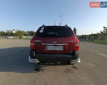 Червоний Хендай Туксон, об'ємом двигуна 1.98 л та пробігом 251 тис. км за 8500 $, фото 9 на Automoto.ua