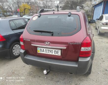 Красный Хендай Туксон, объемом двигателя 2 л и пробегом 207 тыс. км за 8479 $, фото 7 на Automoto.ua