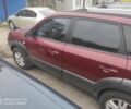 Красный Хендай Туксон, объемом двигателя 2 л и пробегом 207 тыс. км за 8479 $, фото 2 на Automoto.ua