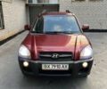 Красный Хендай Туксон, объемом двигателя 1.98 л и пробегом 160 тыс. км за 7900 $, фото 18 на Automoto.ua