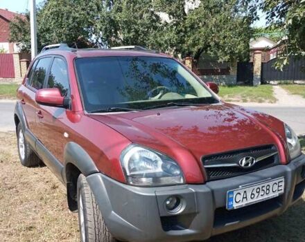 Красный Хендай Туксон, объемом двигателя 1.98 л и пробегом 138 тыс. км за 8899 $, фото 10 на Automoto.ua