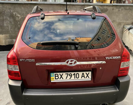 Красный Хендай Туксон, объемом двигателя 1.98 л и пробегом 160 тыс. км за 7900 $, фото 2 на Automoto.ua