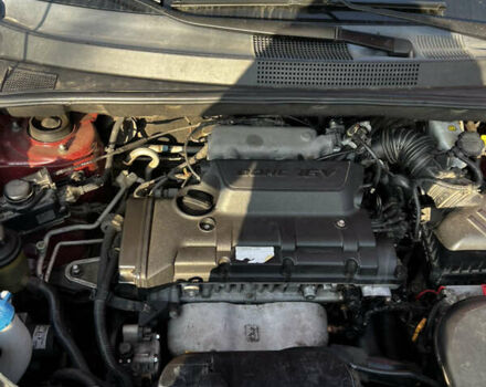 Красный Хендай Туксон, объемом двигателя 1.98 л и пробегом 132 тыс. км за 7850 $, фото 20 на Automoto.ua