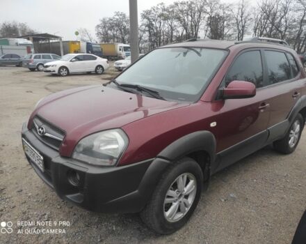 Красный Хендай Туксон, объемом двигателя 2 л и пробегом 207 тыс. км за 8479 $, фото 1 на Automoto.ua