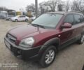 Красный Хендай Туксон, объемом двигателя 2 л и пробегом 207 тыс. км за 8479 $, фото 1 на Automoto.ua