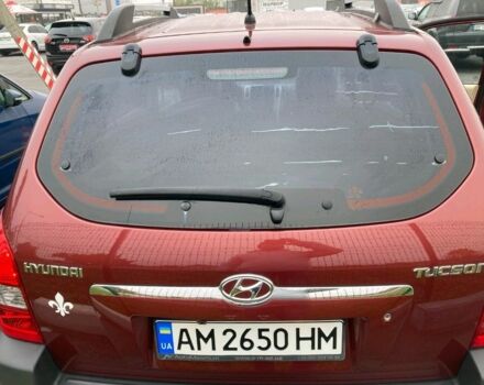 Красный Хендай Туксон, объемом двигателя 2 л и пробегом 187 тыс. км за 9999 $, фото 1 на Automoto.ua