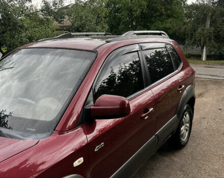 Красный Хендай Туксон, объемом двигателя 1.98 л и пробегом 132 тыс. км за 7850 $, фото 17 на Automoto.ua