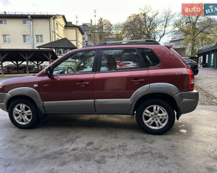 Красный Хендай Туксон, объемом двигателя 1.99 л и пробегом 145 тыс. км за 7999 $, фото 17 на Automoto.ua