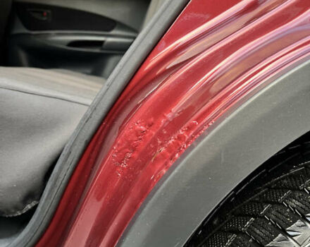 Красный Хендай Туксон, объемом двигателя 1.98 л и пробегом 160 тыс. км за 7900 $, фото 17 на Automoto.ua