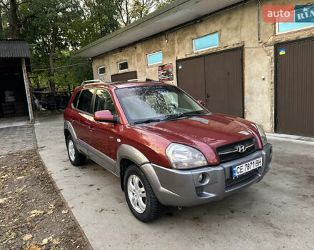 Красный Хендай Туксон, объемом двигателя 1.99 л и пробегом 145 тыс. км за 7999 $, фото 6 на Automoto.ua