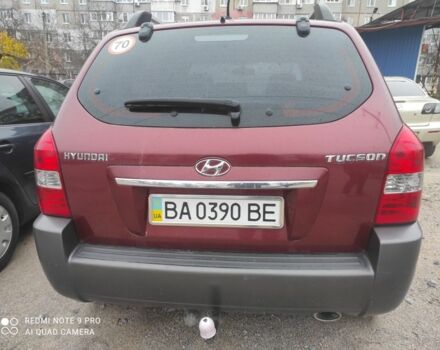 Красный Хендай Туксон, объемом двигателя 2 л и пробегом 207 тыс. км за 8479 $, фото 5 на Automoto.ua