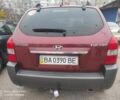 Красный Хендай Туксон, объемом двигателя 2 л и пробегом 207 тыс. км за 8479 $, фото 5 на Automoto.ua