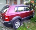 Красный Хендай Туксон, объемом двигателя 1.98 л и пробегом 231 тыс. км за 8500 $, фото 4 на Automoto.ua