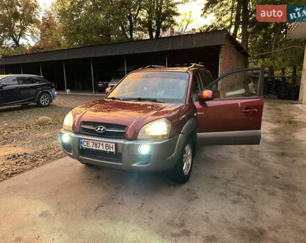 Красный Хендай Туксон, объемом двигателя 1.99 л и пробегом 145 тыс. км за 7999 $, фото 37 на Automoto.ua