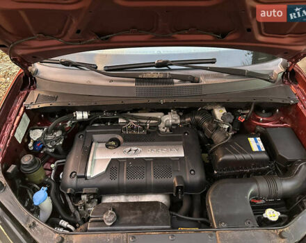 Красный Хендай Туксон, объемом двигателя 1.99 л и пробегом 145 тыс. км за 7999 $, фото 40 на Automoto.ua